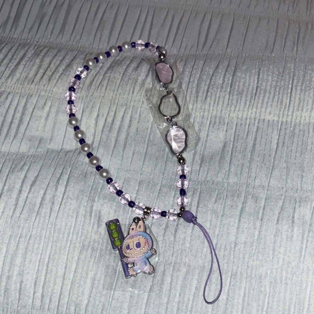 BIG INTO ENERGY PHONE CHARM ( LUCK )